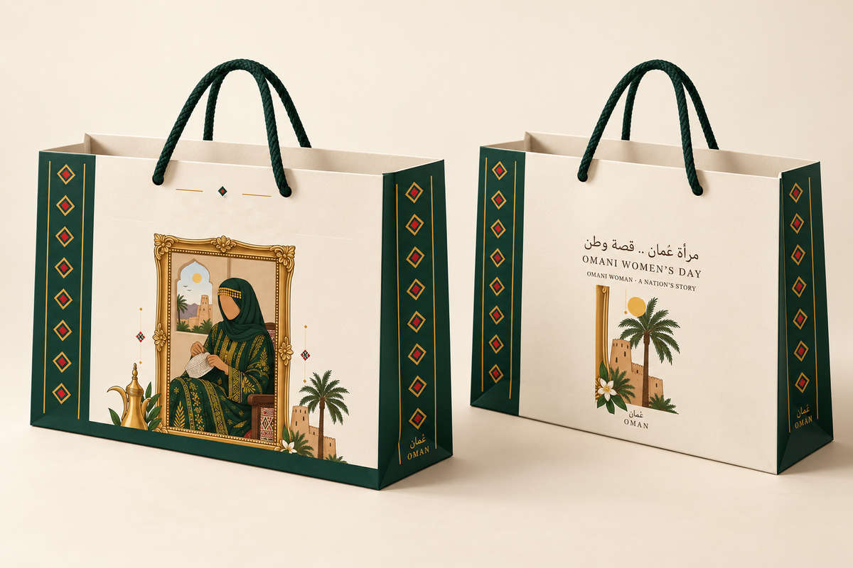 Omani Women's Day printed paper gift bag with green rope handles